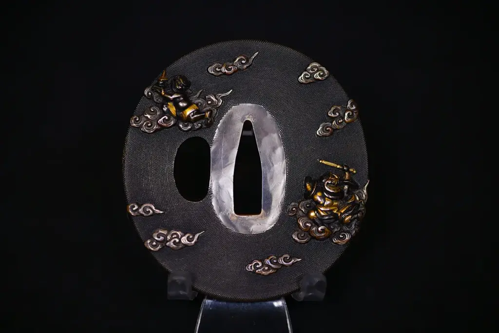 Marugata shakudo tsuba samurai and oni