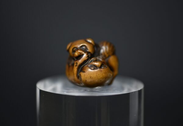 netsuke dogs playing