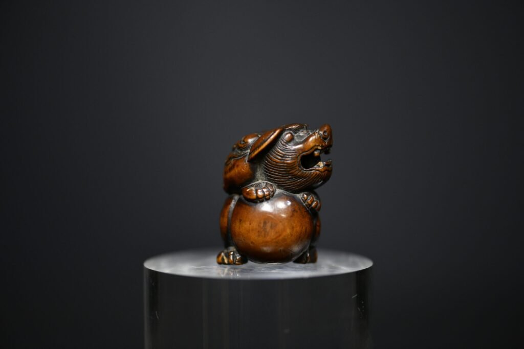 Netsuke shishi wood III