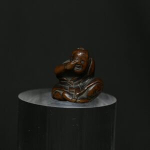 Netsuke man eye wood