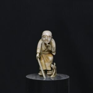 Netsuke elder and dog ivory