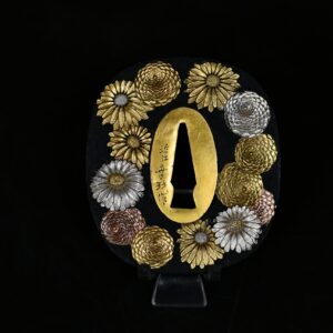Shakudo Marugata Tsuba Chrisantemum