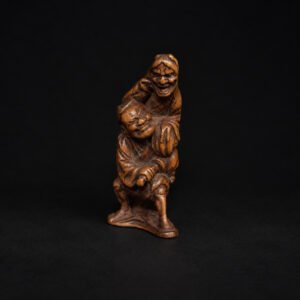 Netsuke Edo Hannya che attacca un Samurai