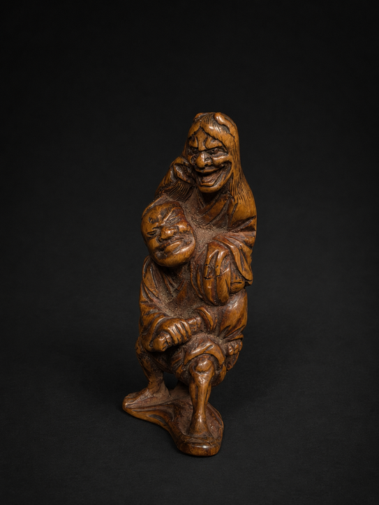 Netsuke Edo Hannya atacando a un samurái