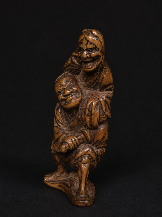 Netsuke Edo Hannya atacando a un samurái