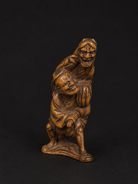 Netsuke Edo Hannya atacando a un samurái