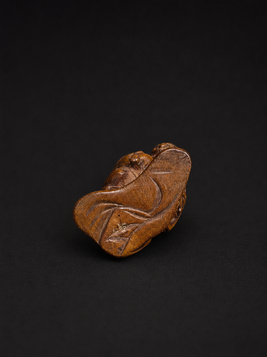 Netsuke Edo Hannya atacando a un samurái