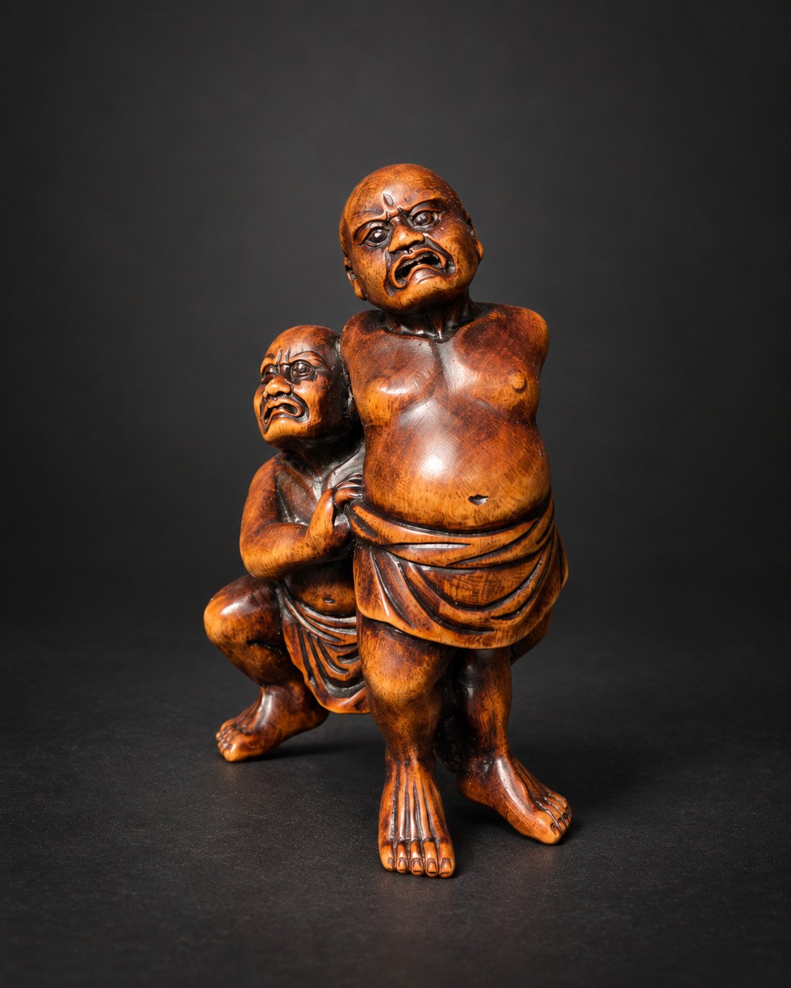 Netsuke of Two Sumō Wrestlers Performing Kawazu-gake