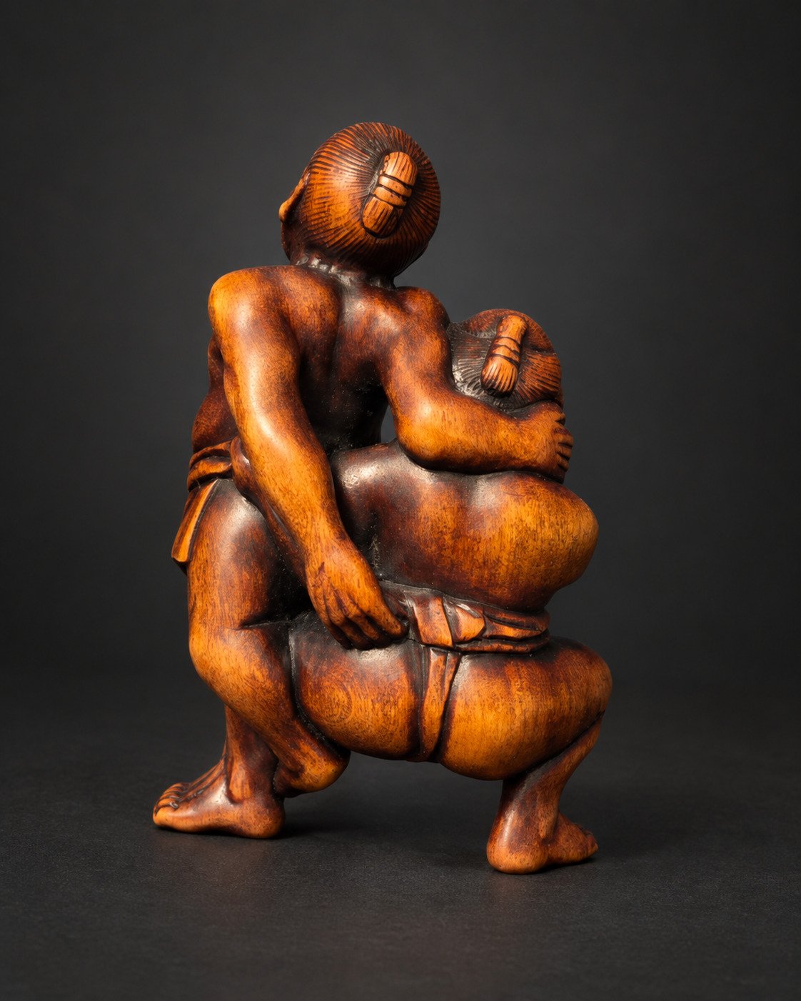 Netsuke of Two Sumō Wrestlers Performing Kawazu-gake