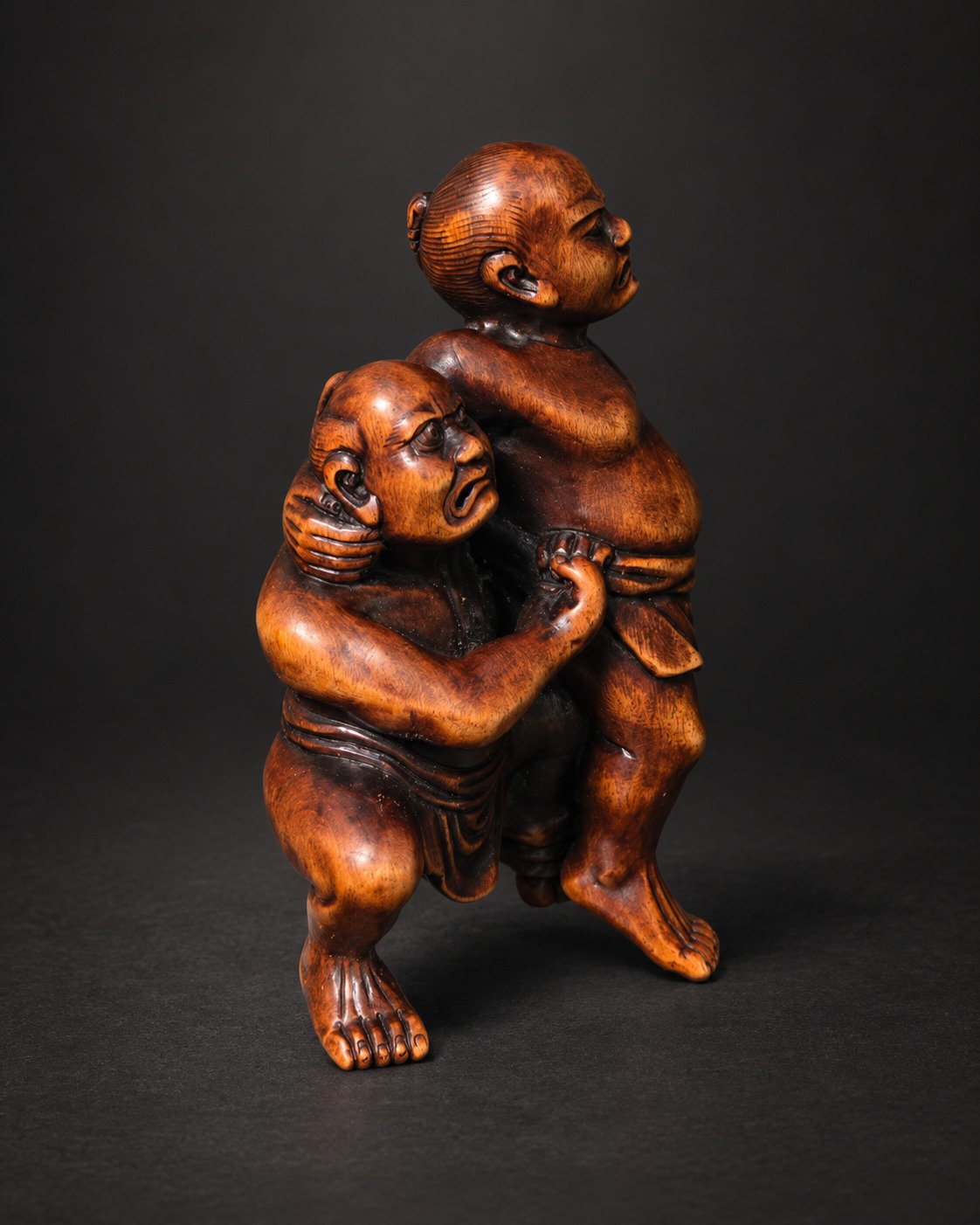 Netsuke of Two Sumō Wrestlers Performing Kawazu-gake