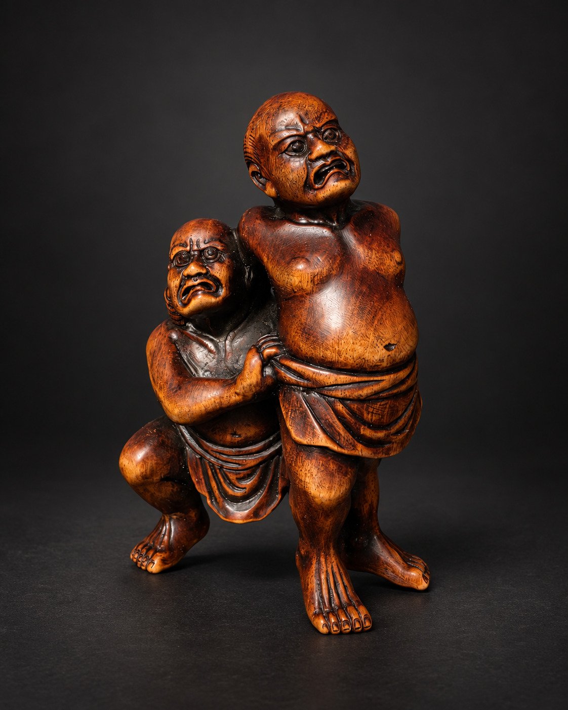 Netsuke of Two Sumō Wrestlers Performing Kawazu-gake