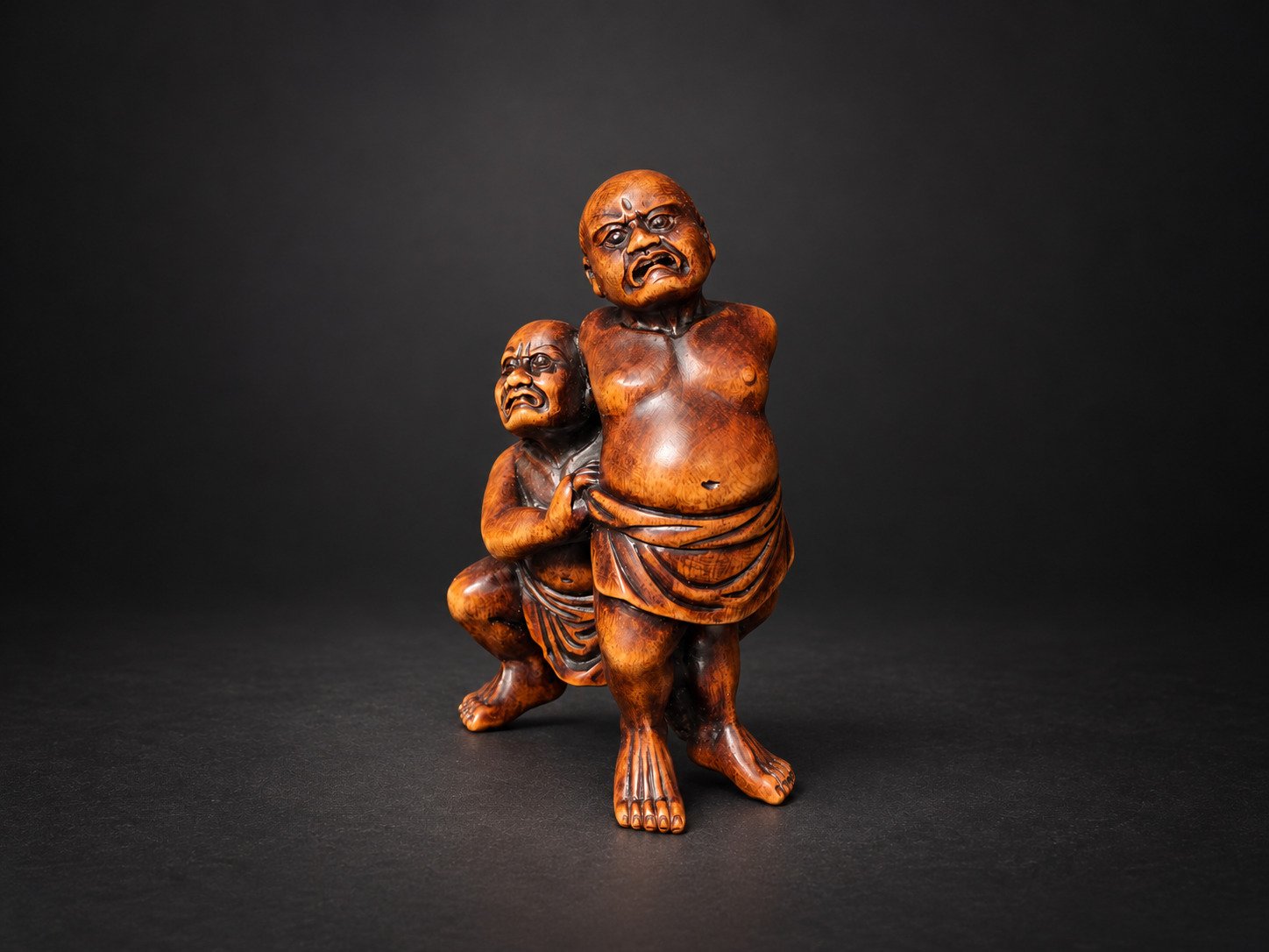 Netsuke of Two Sumō Wrestlers Performing Kawazu-gake