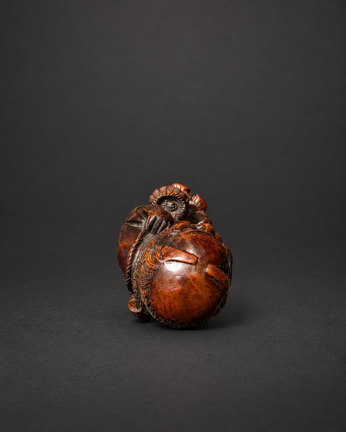 Netsuke of an Old Fisherman with Carp
