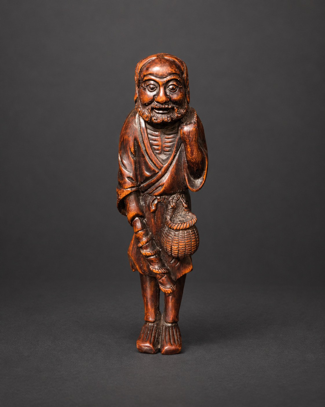 Netsuke of an Old Fisherman with Carp