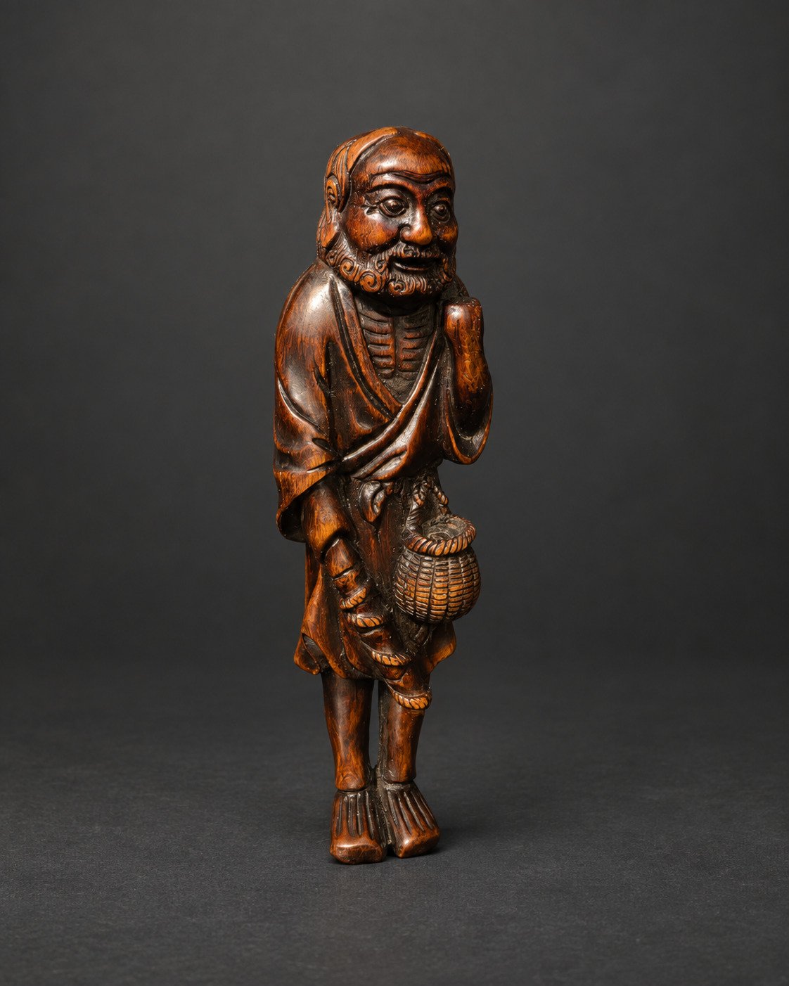 Netsuke of an Old Fisherman with Carp