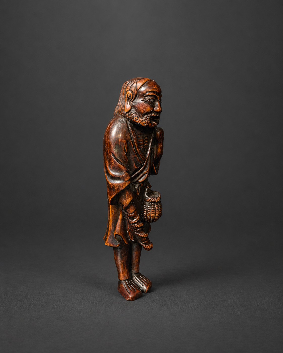 Netsuke of an Old Fisherman with Carp