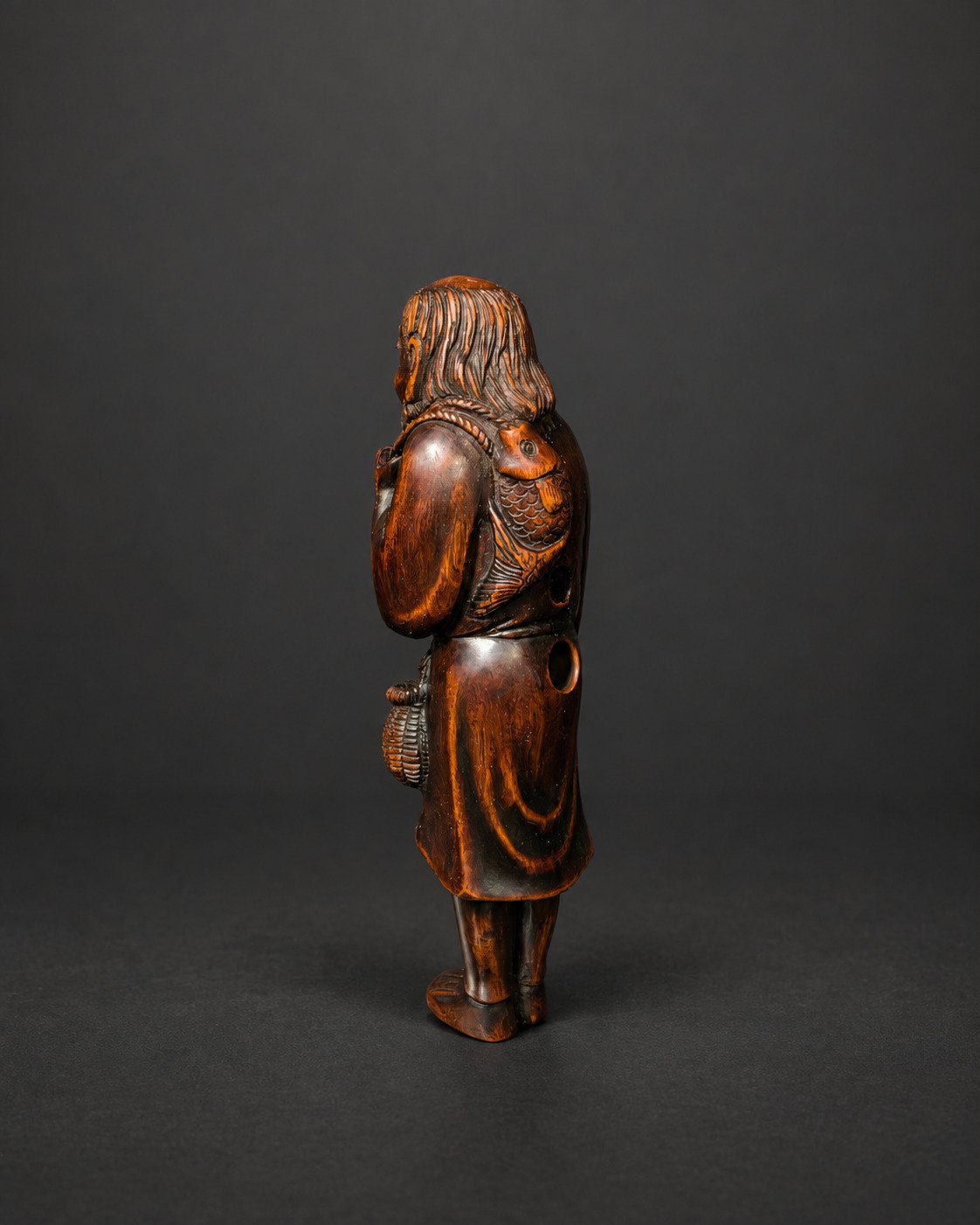 Netsuke of an Old Fisherman with Carp