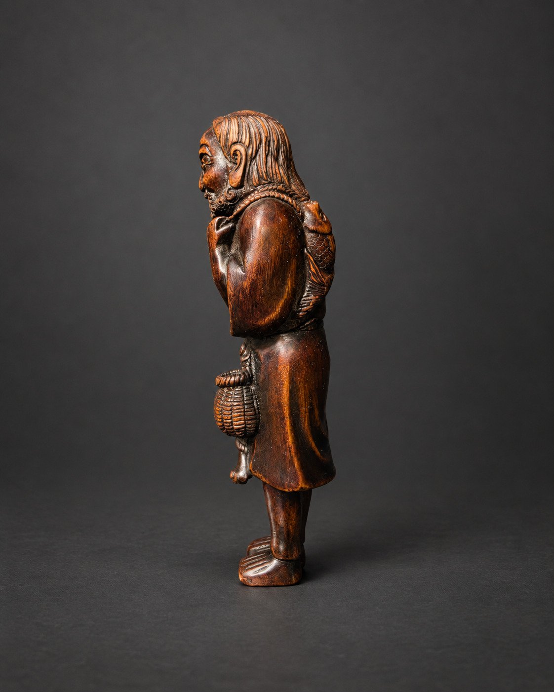 Netsuke of an Old Fisherman with Carp