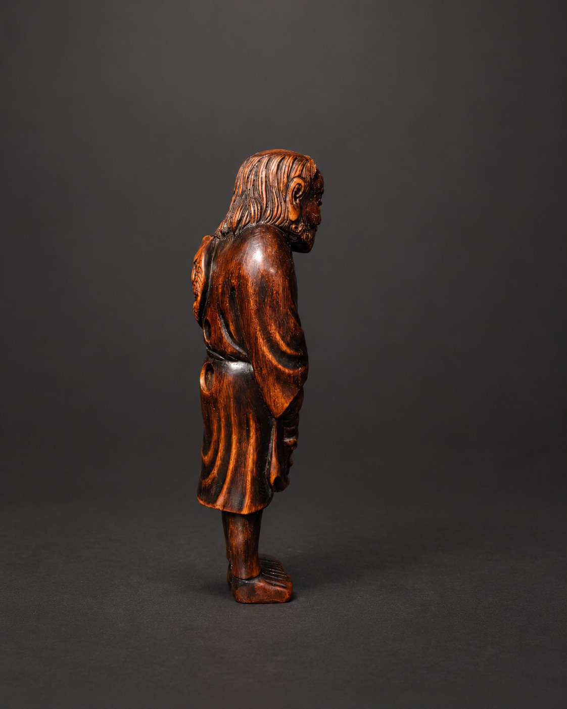 Netsuke of an Old Fisherman with Carp