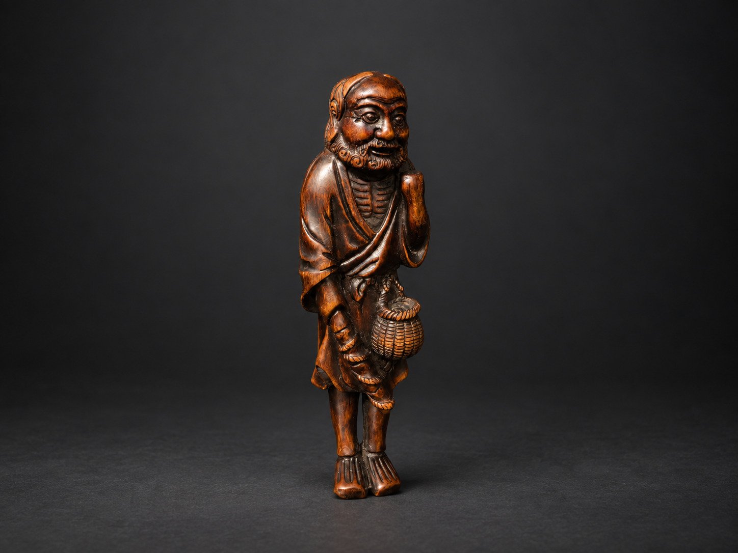 Netsuke of an Old Fisherman with Carp