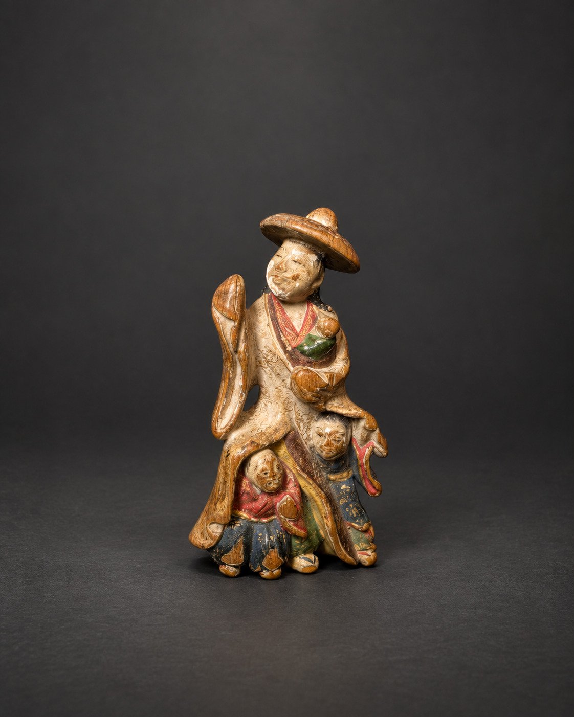 Saishiki Netsuke of Tokiwa Gozen with Her Three Sons