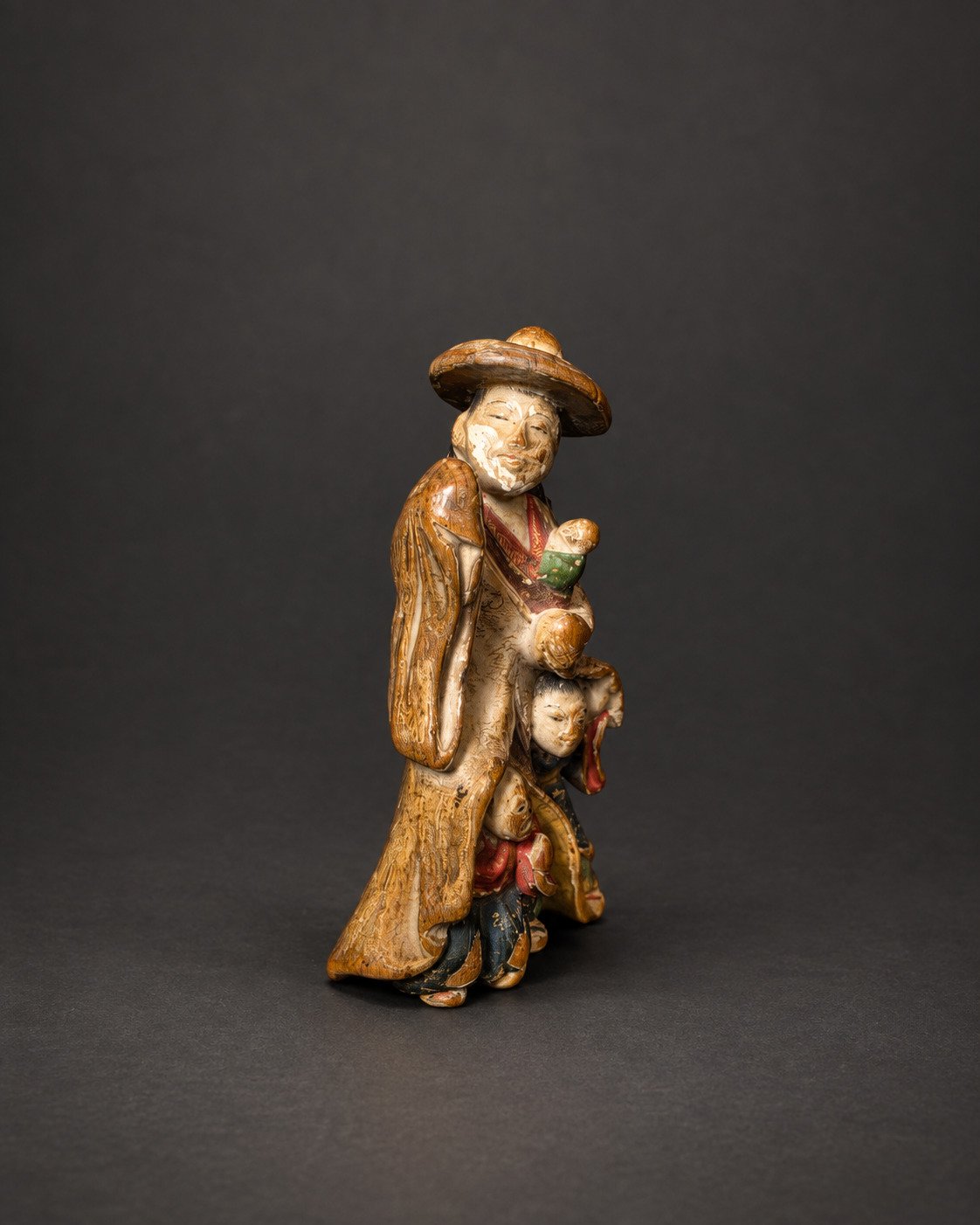 Saishiki Netsuke of Tokiwa Gozen with Her Three Sons
