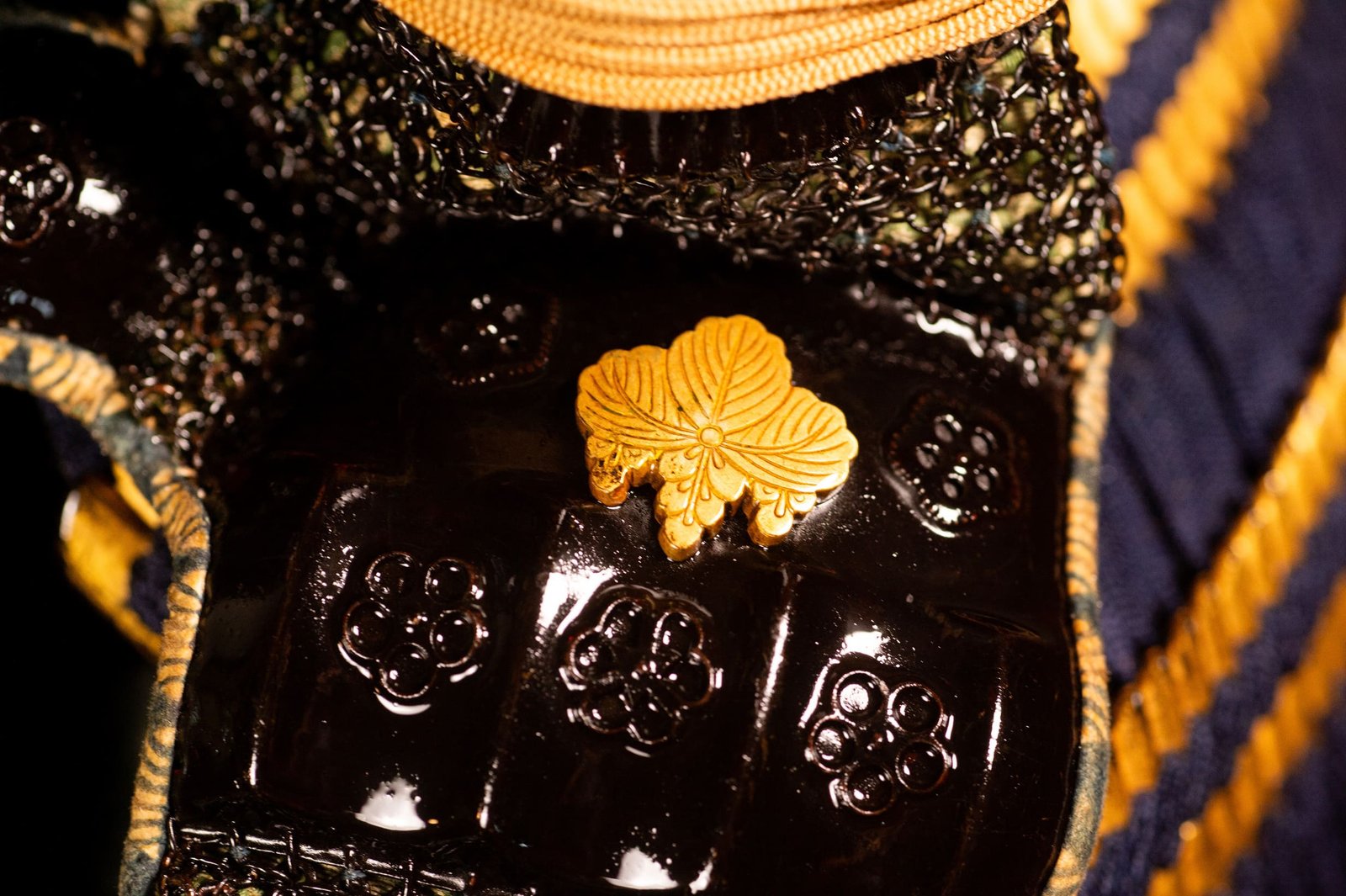 Edo-period Japanese samurai armor with crescent-moon maedate, Tokugawa mitsuba-aoi crests and indigo lacing