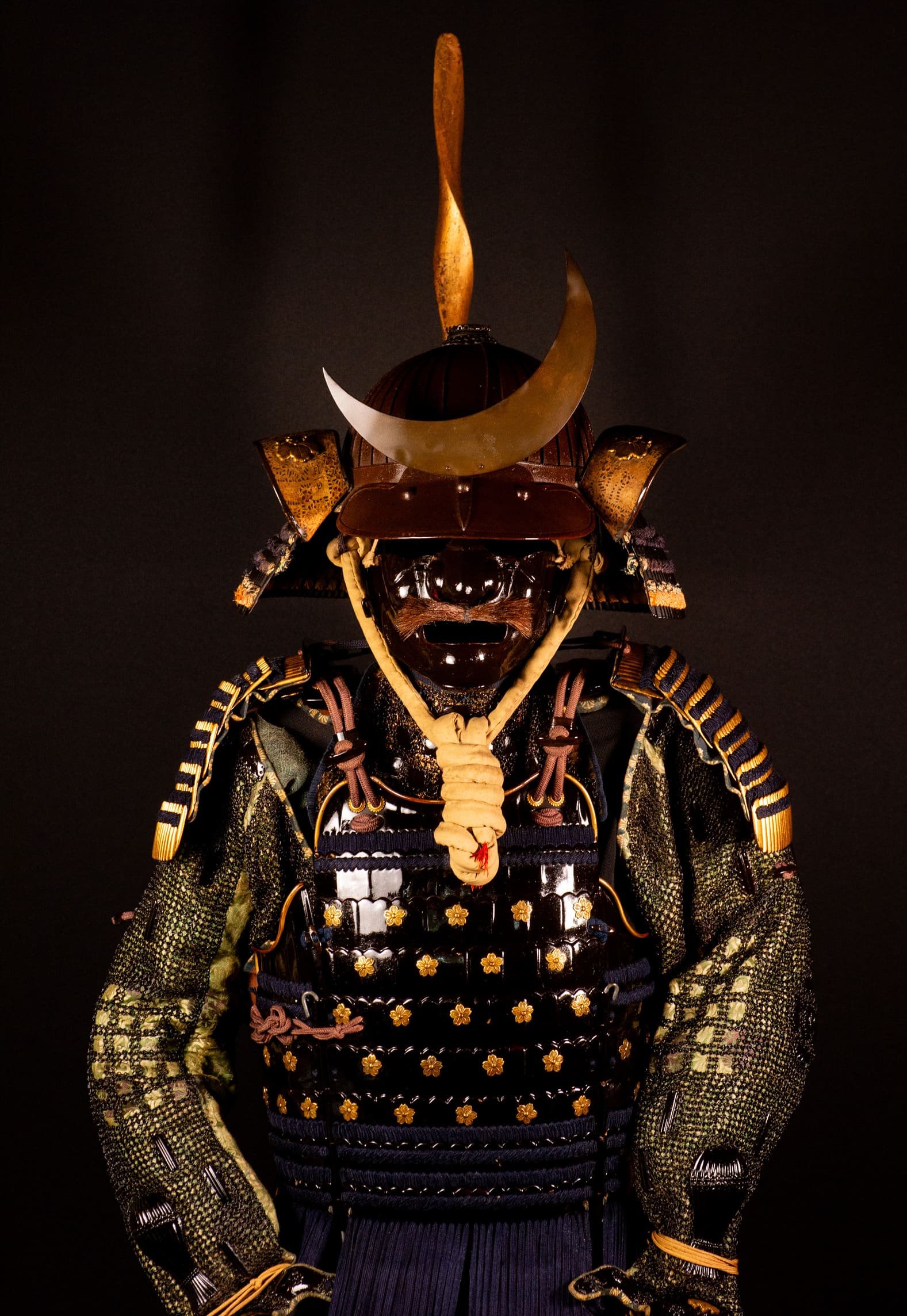 Edo-period Japanese samurai armor with crescent-moon maedate, Tokugawa mitsuba-aoi crests and indigo lacing