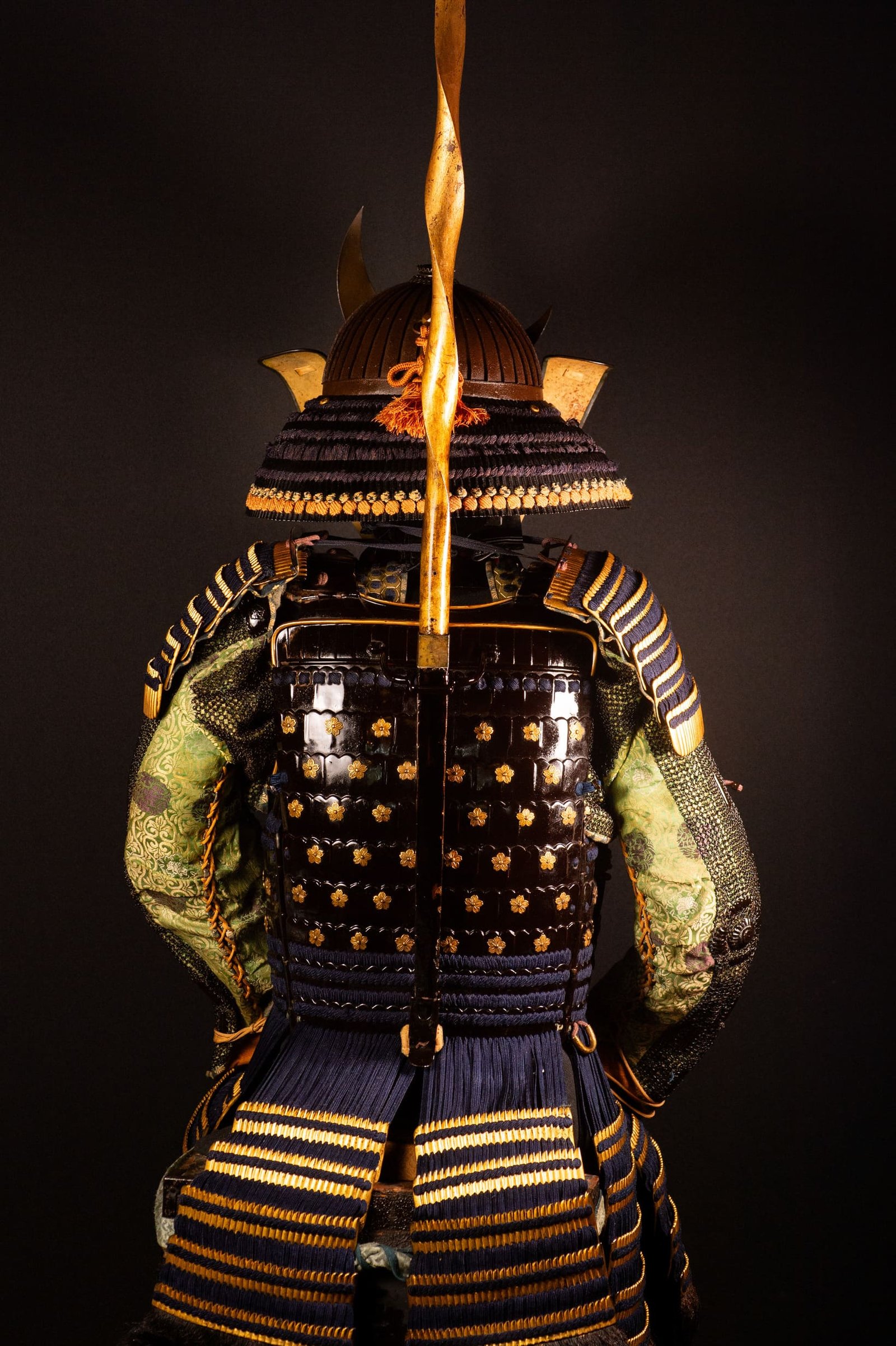 Edo-period Japanese samurai armor with crescent-moon maedate, Tokugawa mitsuba-aoi crests and indigo lacing