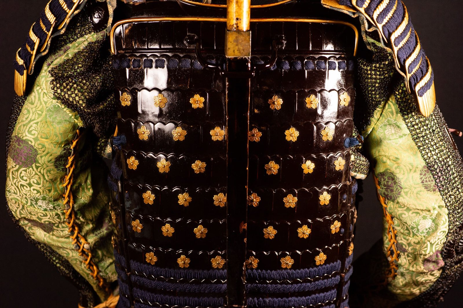 Edo-period Japanese samurai armor with crescent-moon maedate, Tokugawa mitsuba-aoi crests and indigo lacing