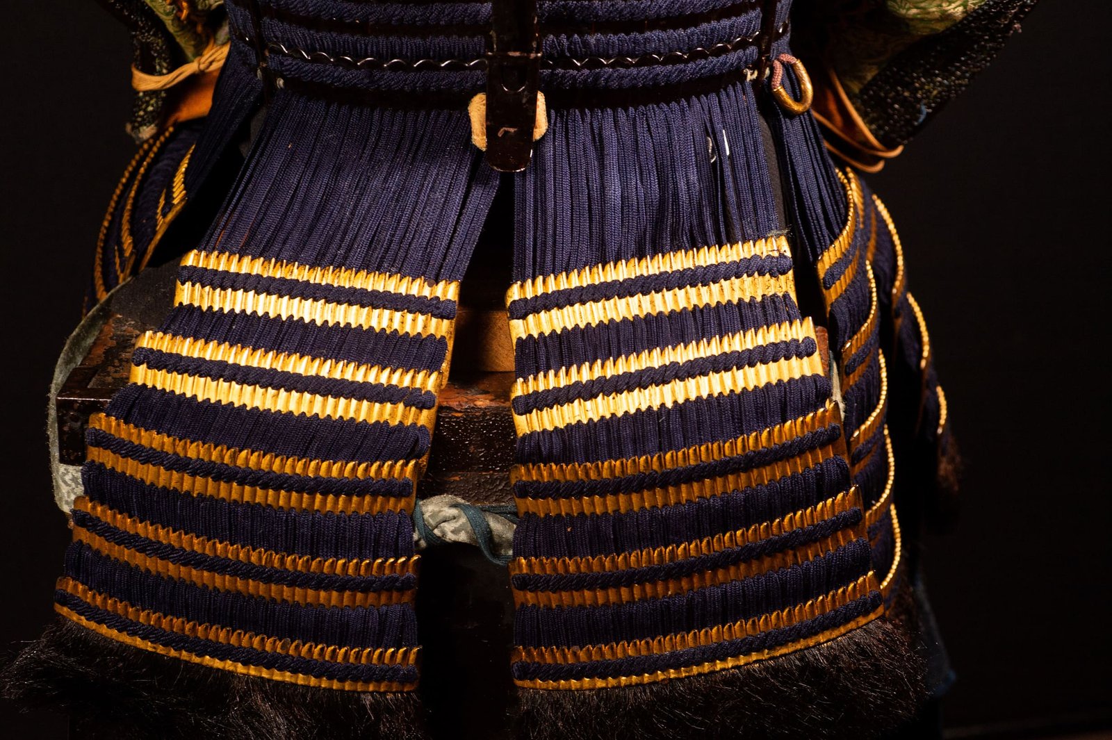 Edo-period Japanese samurai armor with crescent-moon maedate, Tokugawa mitsuba-aoi crests and indigo lacing