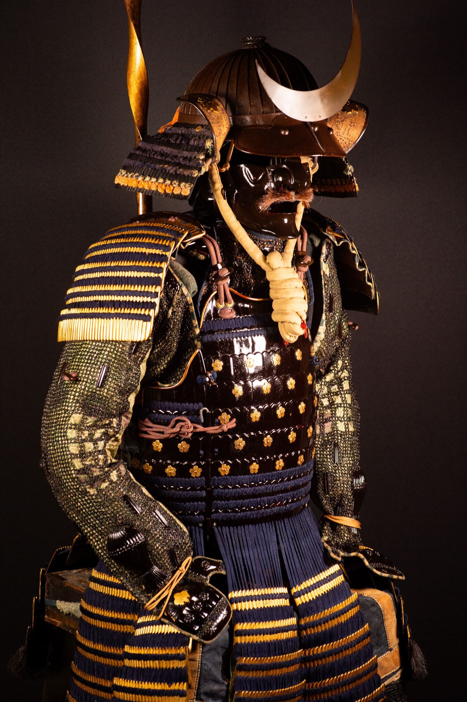 Edo-period Japanese samurai armor with crescent-moon maedate, Tokugawa mitsuba-aoi crests and indigo lacing