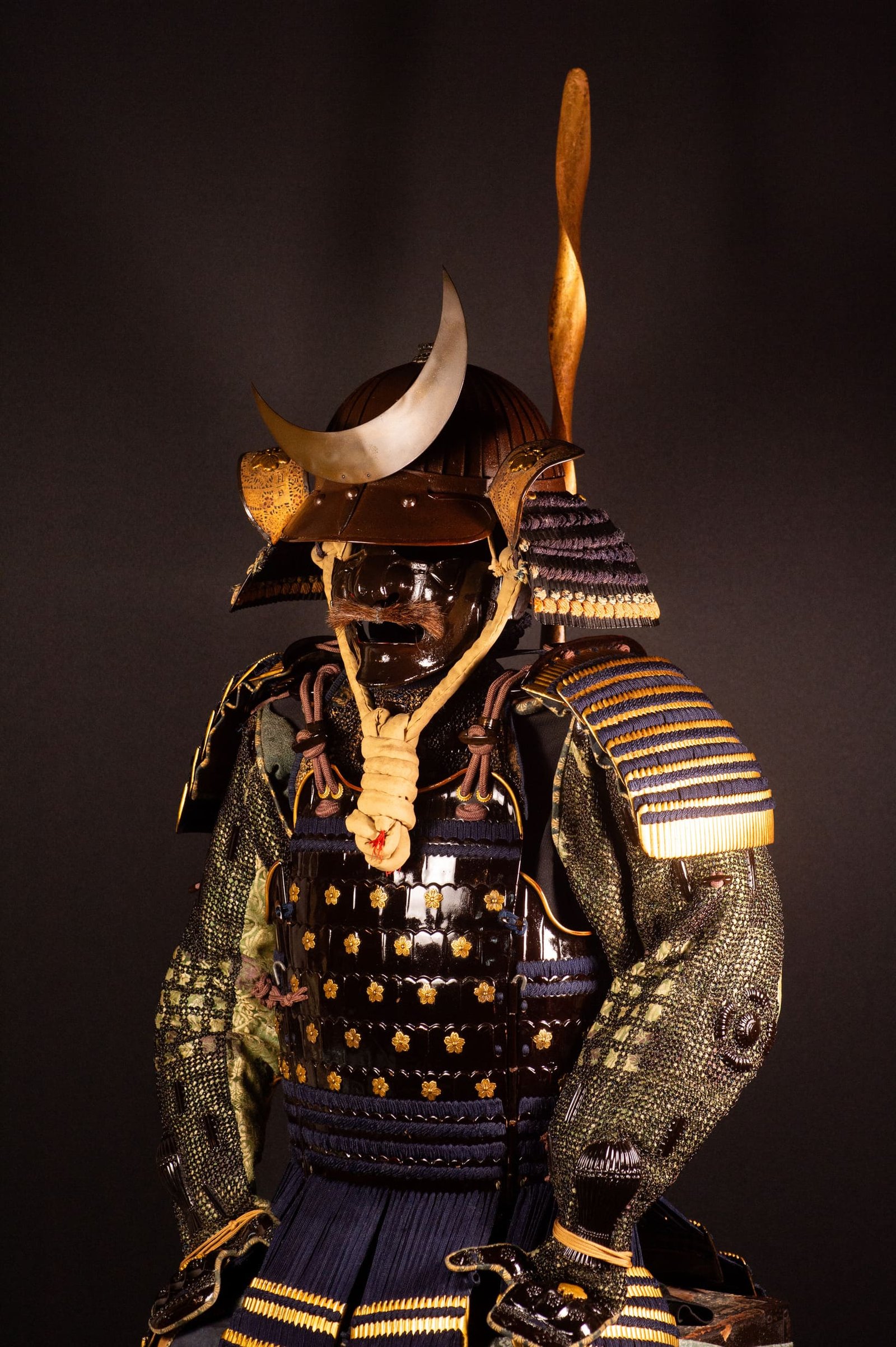 Edo-period Japanese samurai armor with crescent-moon maedate, Tokugawa mitsuba-aoi crests and indigo lacing