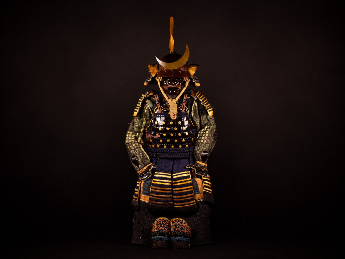 Edo-period Japanese samurai armor with crescent-moon maedate, Tokugawa mitsuba-aoi crests and indigo lacing