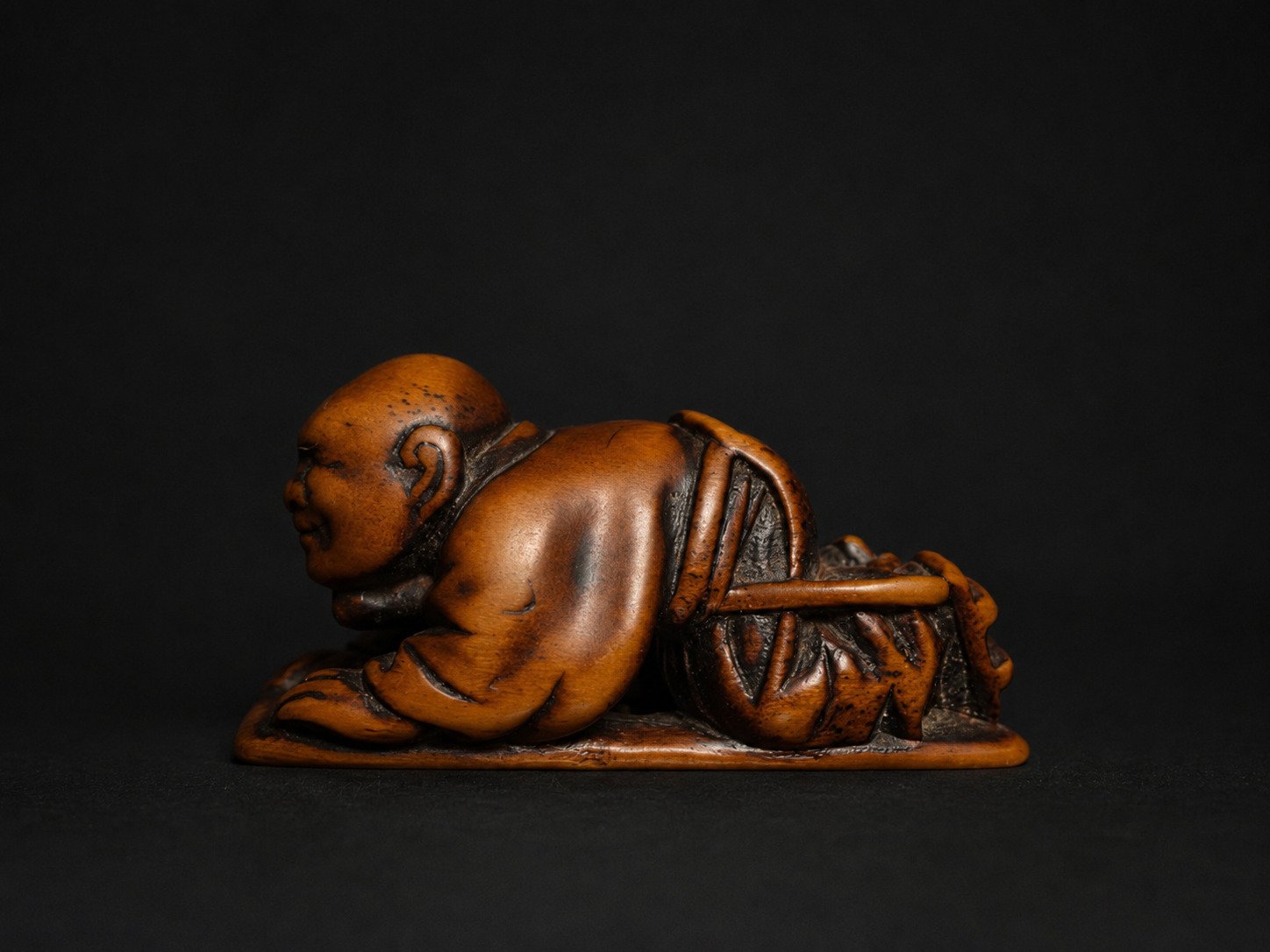 Signed Japanese Wood Netsuke – Crouching Figure