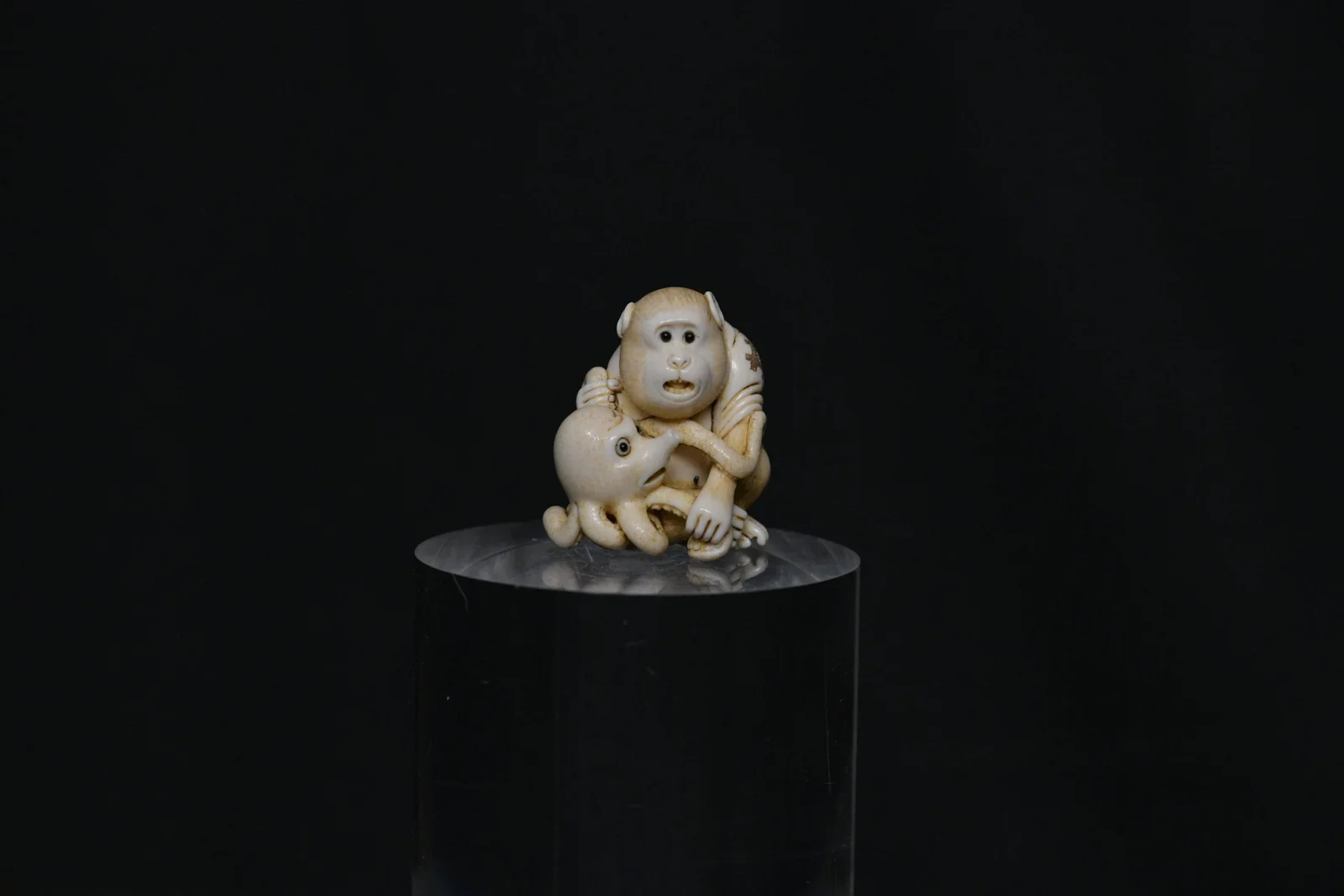 Netsuke monkey octopus ivory