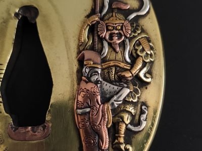 Tsuba marugata Kinkō firmada