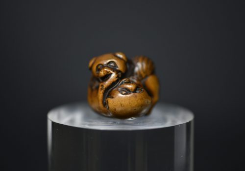netsuke dogs playing
