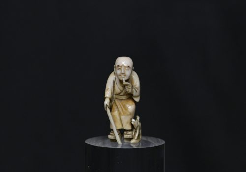 Netsuke elder and dog ivory