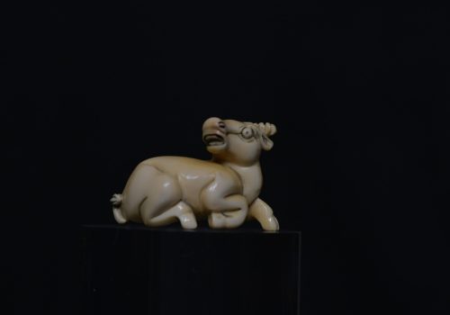 Netsuke reclining ox ivory