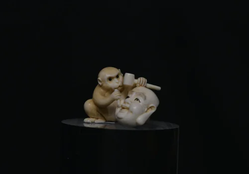 Netsuke monkey mask ivory