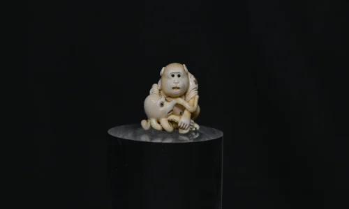 Netsuke monkey octopus ivory