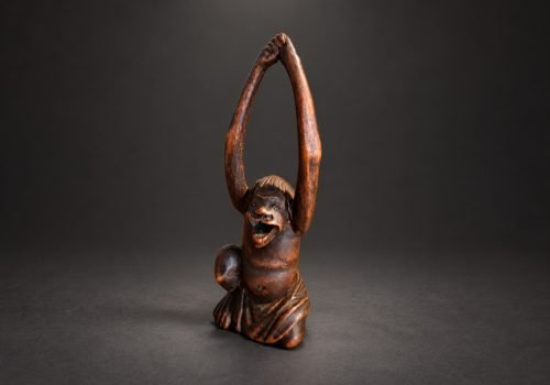 Wood Netsuke of Tenaga, the Long-Armed Man, Stretching – Late Edo Period